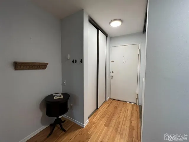 a view of a livingroom with wooden floor