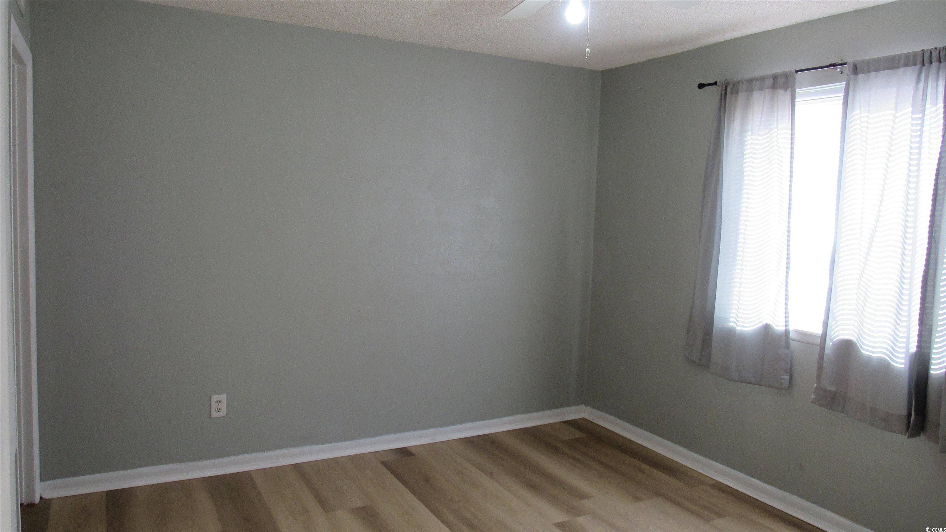 3555 Highway 544 Conway, SC 29526 - Photo 13 of 20 Bathroom featuring vanity, a shower, and toilet