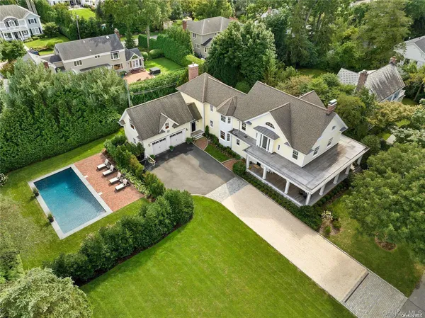 an aerial view of a house with a garden