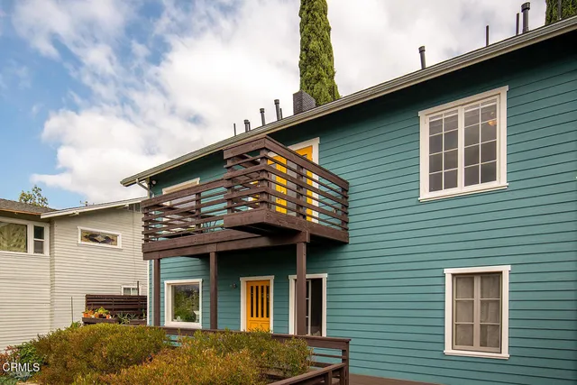 a view of a house with a balcony