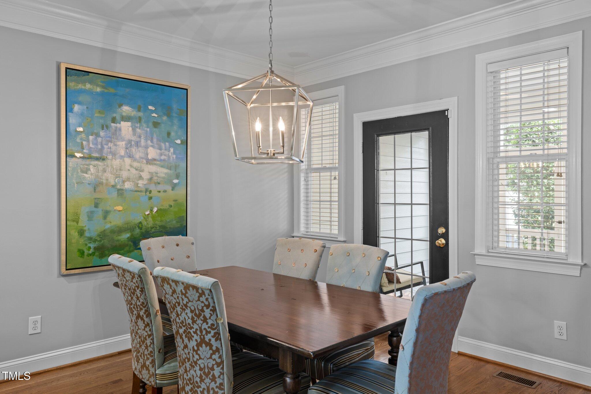 3902 Stags Leap Circle Raleigh, NC 27612 - Photo 18 of 53 a view of a dining room with furniture window and outside view