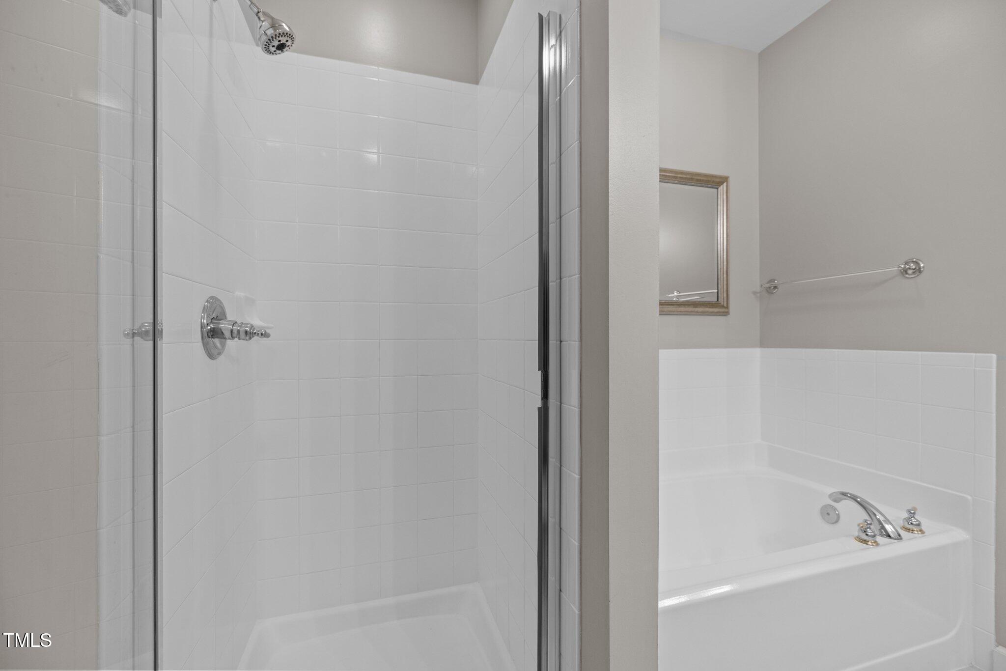 3902 Stags Leap Circle Raleigh, NC 27612 - Photo 25 of 53 a bathroom with a bathtub