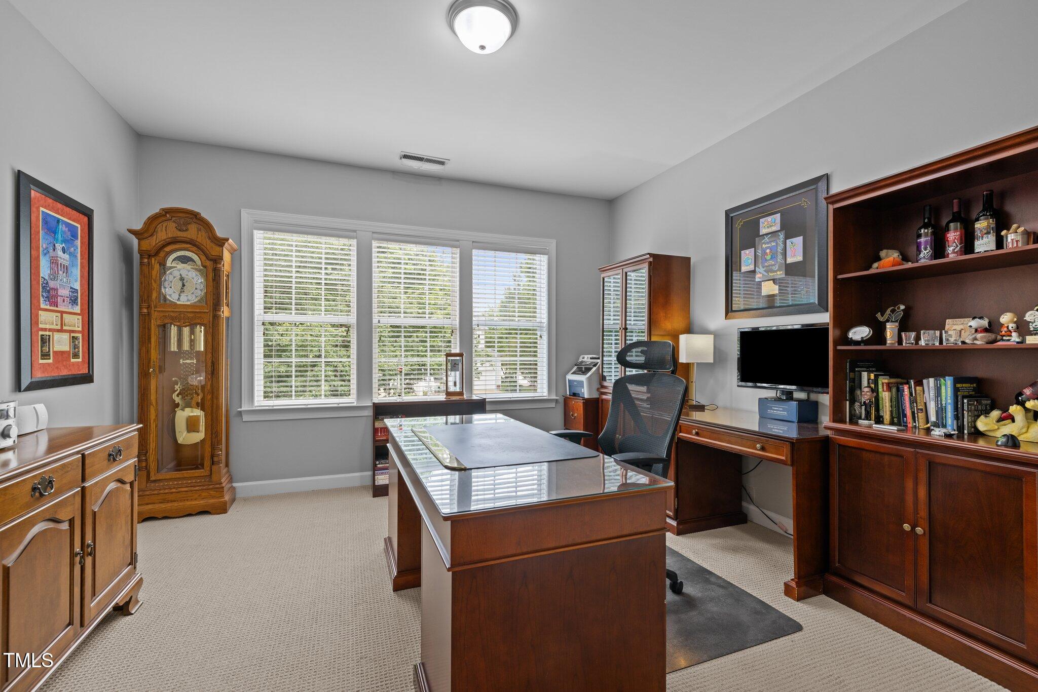 3902 Stags Leap Circle Raleigh, NC 27612 - Photo 28 of 53 a kitchen that has a sink cabinets and window
