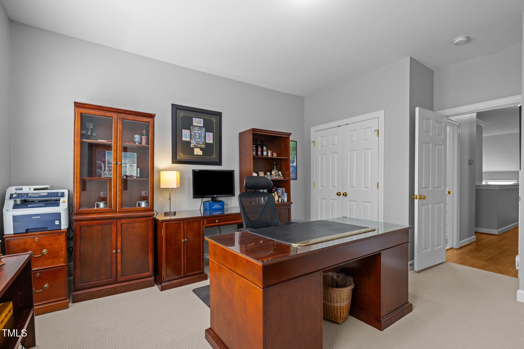 3902 Stags Leap Circle Raleigh, NC 27612 - Photo 29 of 53 a kitchen with stainless steel appliances granite countertop a stove and a refrigerator