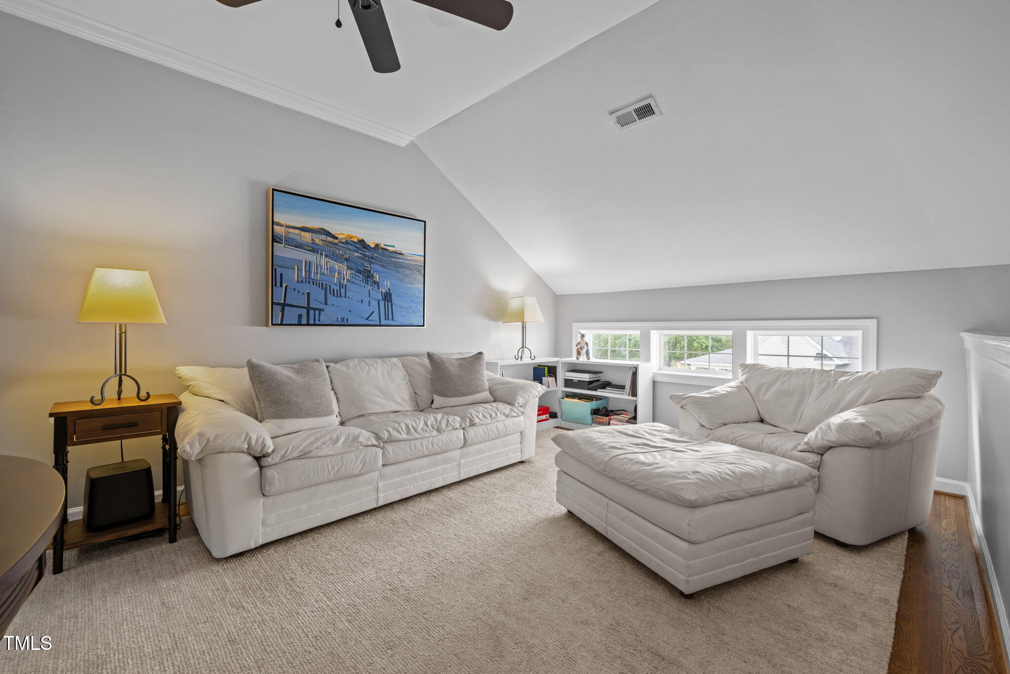 3902 Stags Leap Circle Raleigh, NC 27612 - Photo 32 of 53 a living room with furniture and a window