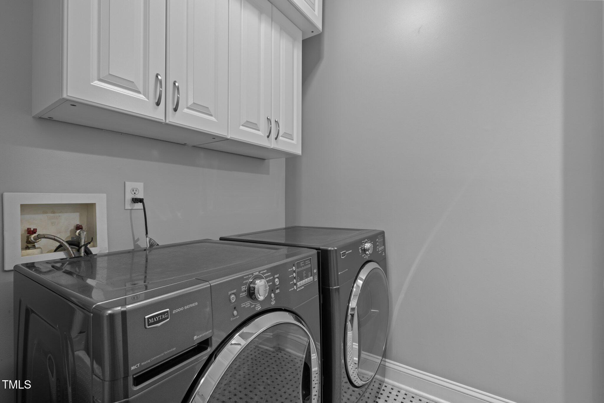 3902 Stags Leap Circle Raleigh, NC 27612 - Photo 34 of 53 a utility room with dryer and washer