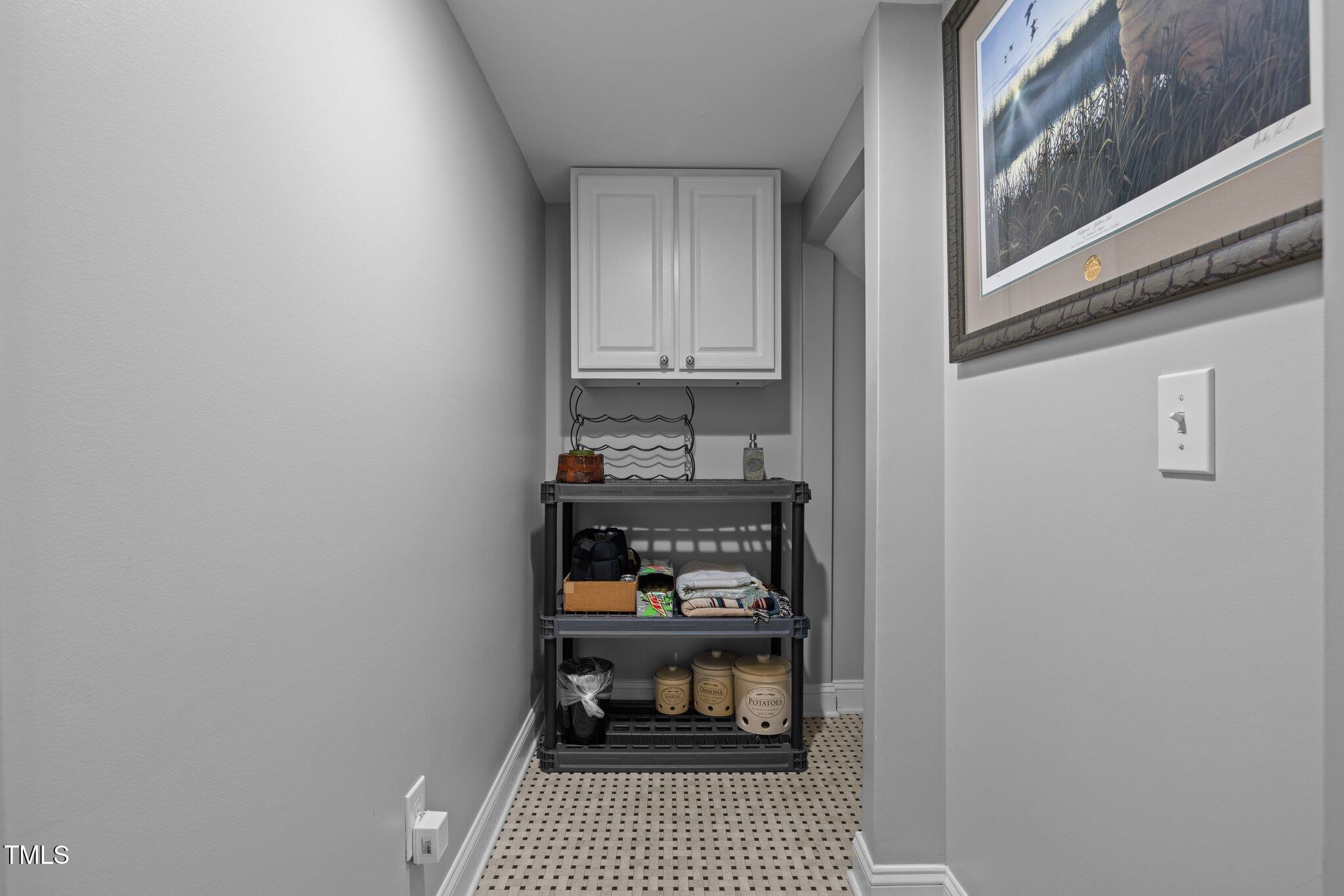 3902 Stags Leap Circle Raleigh, NC 27612 - Photo 35 of 53 a room with a door and a window