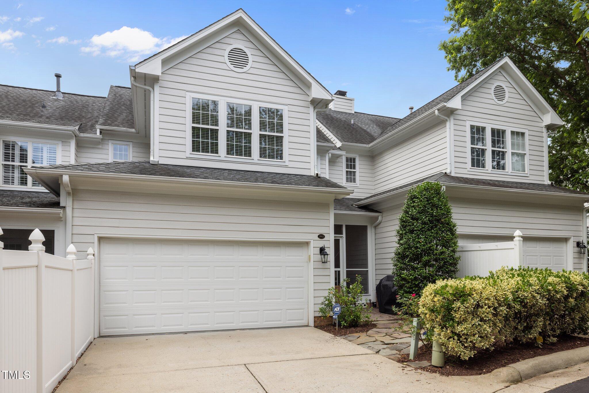 3902 Stags Leap Circle Raleigh, NC 27612 - Photo 43 of 53 a front view of a house with a garage