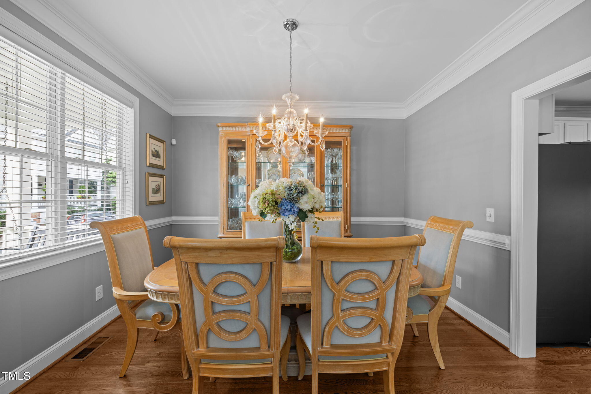 3902 Stags Leap Circle Raleigh, NC 27612 - Photo 10 of 53 a view of a dining room with furniture window and wooden floor