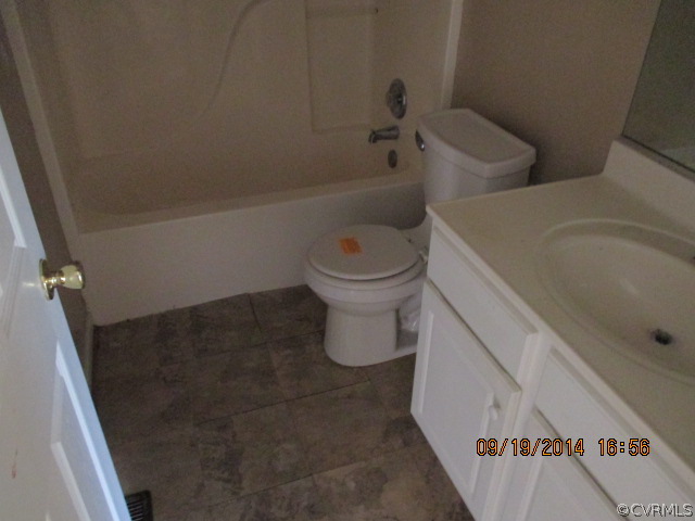 3208 Purvis Road Richmond, VA 23223 - Photo 9 of 10 a bathroom with a toilet and a shower