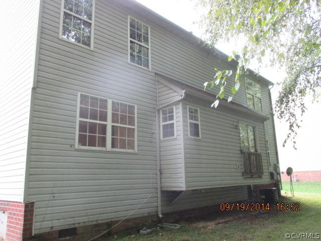 3208 Purvis Road Richmond, VA 23223 - Photo 10 of 10 a view of a house with a yard