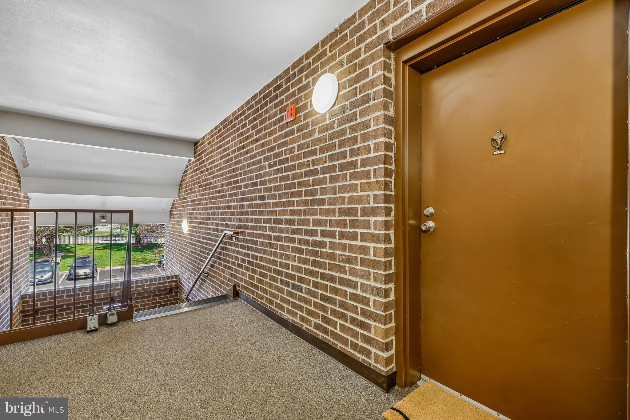 7804 Guildberry Court, Unit 301 Gaithersburg, MD 20879 - Photo 3 of 33 a view of a door and chair