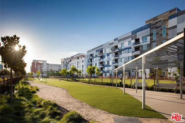 a lobby with furniture and wooden floor