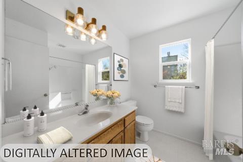 2654 Edison Street Graton, CA 95444 - Photo 25 of 63 a bathroom with a sink a toilet and a mirror