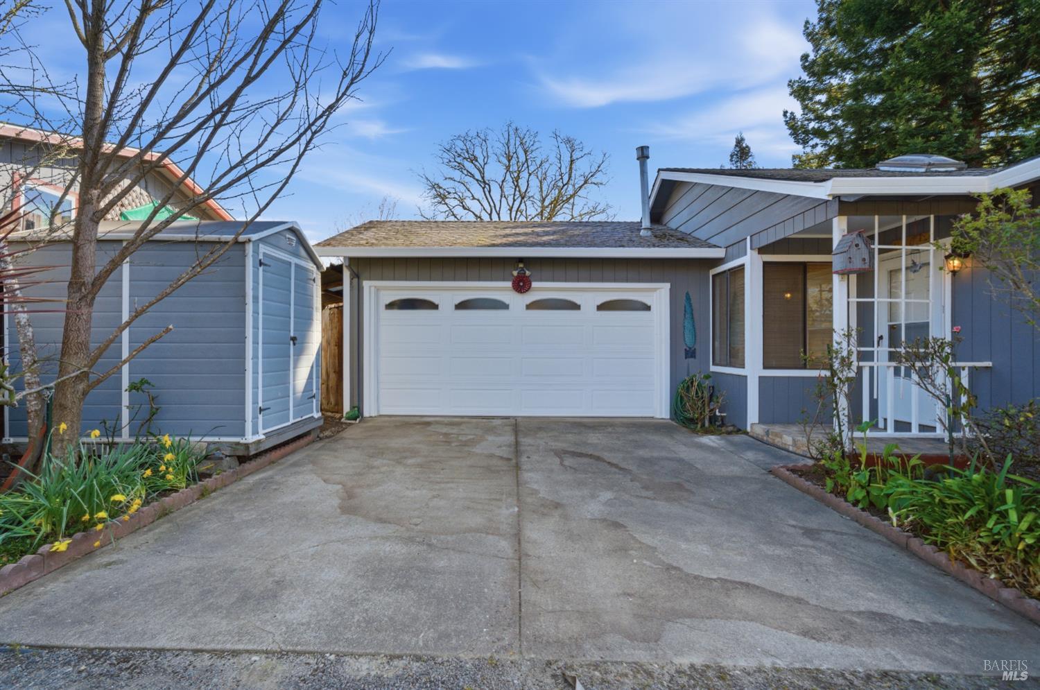 2654 Edison Street Graton, CA 95444 - Photo 3 of 63 a view of a house with a yard and garage