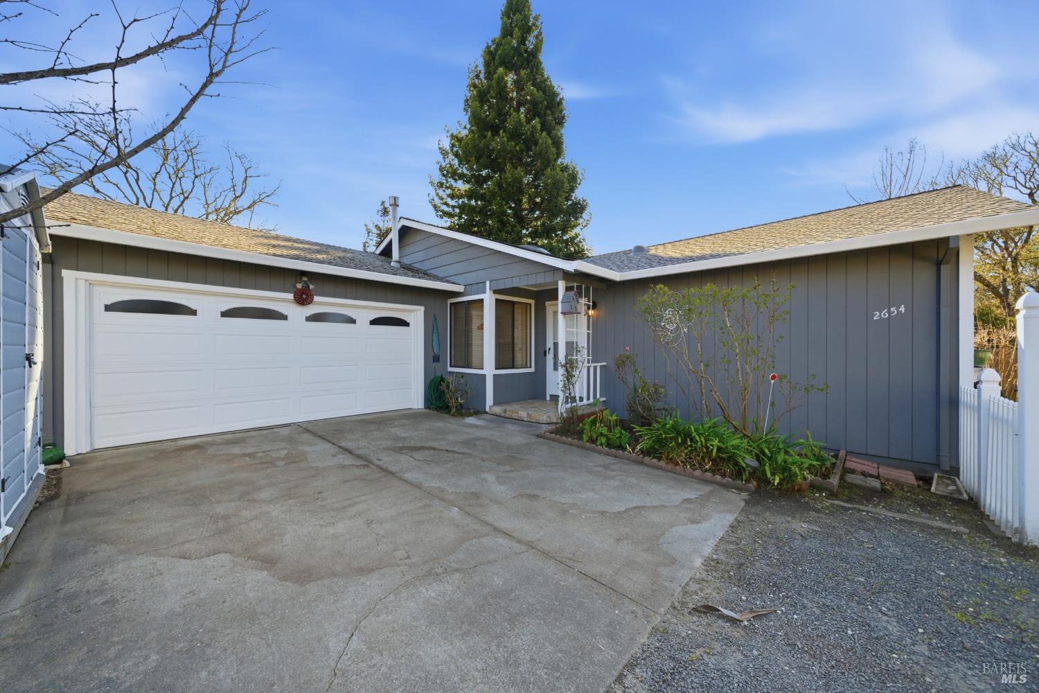 2654 Edison Street Graton, CA 95444 - Photo 4 of 63 a view of a house with a yard and garage