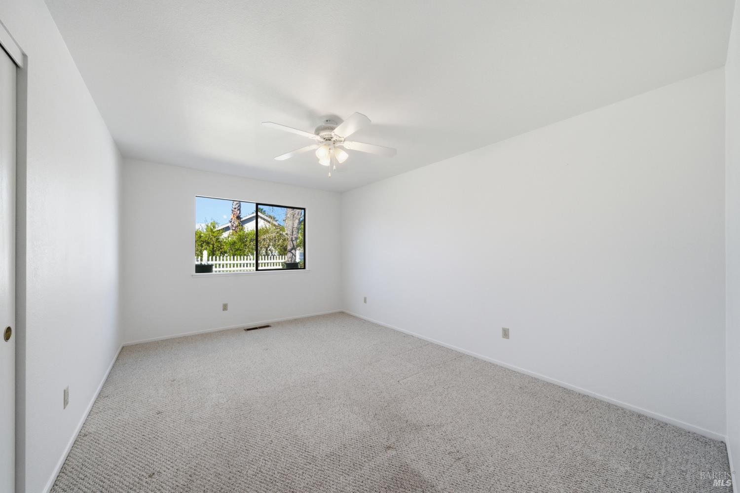 2654 Edison Street Graton, CA 95444 - Photo 58 of 63 an empty room with windows and ceiling fan view