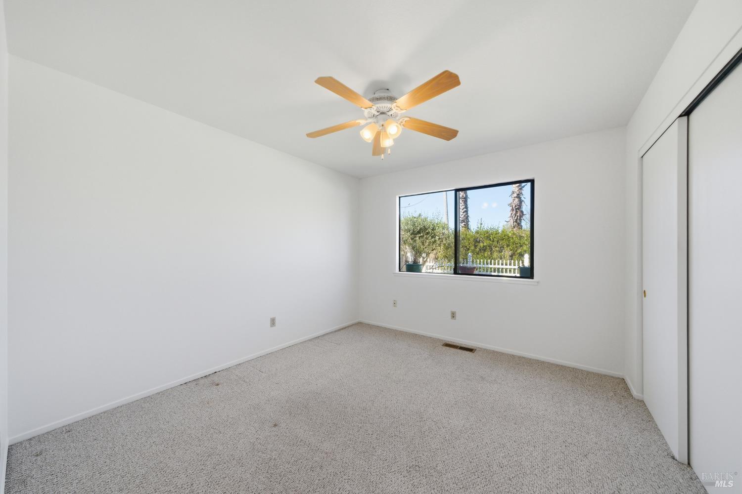 2654 Edison Street Graton, CA 95444 - Photo 60 of 63 an empty room with a window and a fan