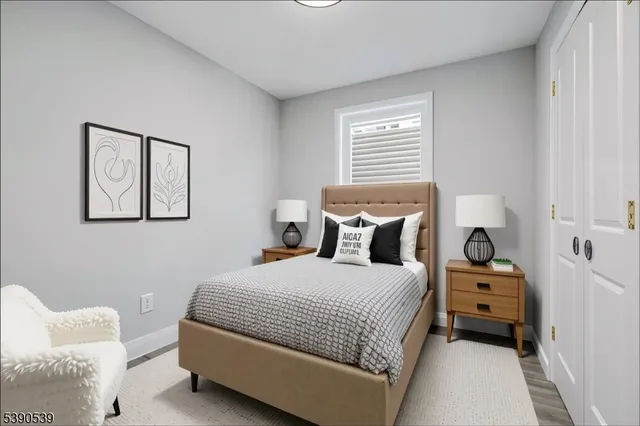 a bedroom with a bed and furniture