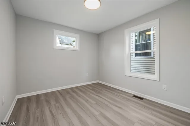 a view of a room that has a window in it