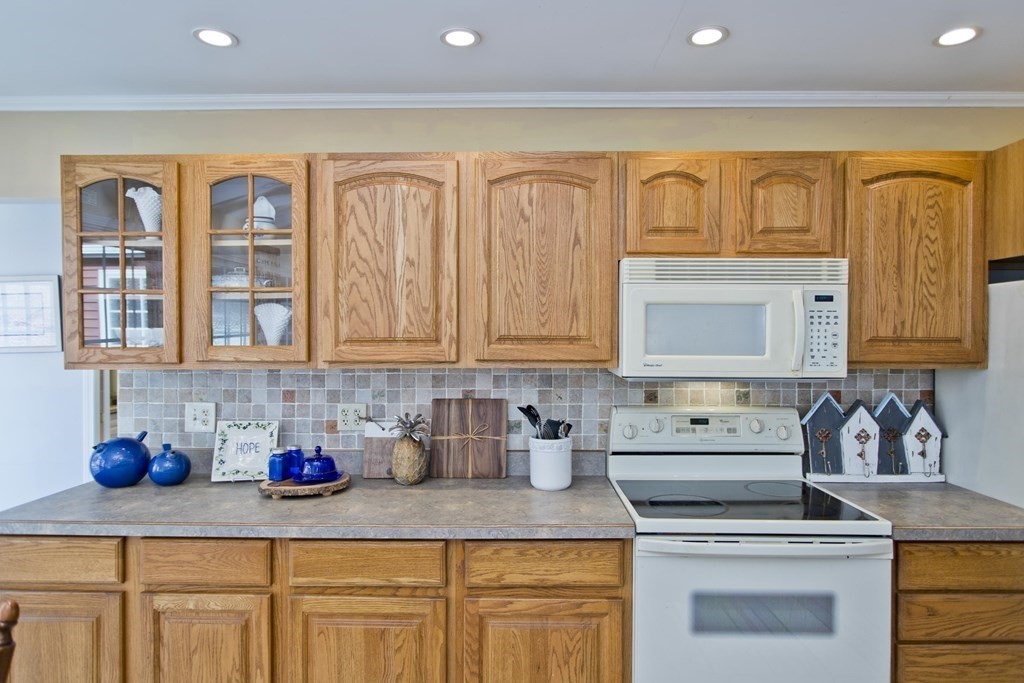 146 Huntington Road Russell, MA 01071 - Photo 11 of 42 a kitchen with granite countertop a sink stainless steel appliances and cabinets
