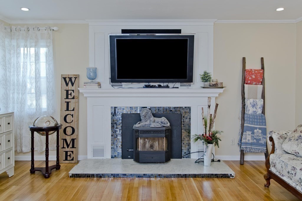 146 Huntington Road Russell, MA 01071 - Photo 15 of 42 a living room with furniture and a flat screen tv