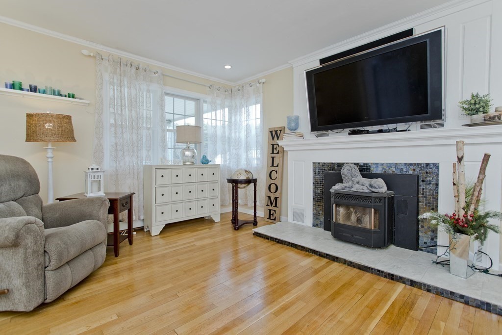 146 Huntington Road Russell, MA 01071 - Photo 16 of 42 a living room with furniture and a fireplace or television