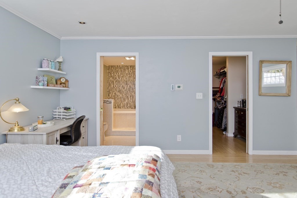 146 Huntington Road Russell, MA 01071 - Photo 29 of 42 a bedroom with a bed and a window