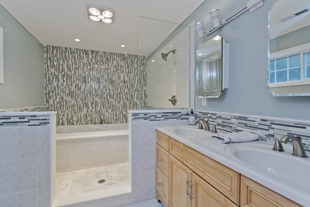 146 Huntington Road Russell, MA 01071 - Photo 31 of 42 a bathroom with a sink and a mirror