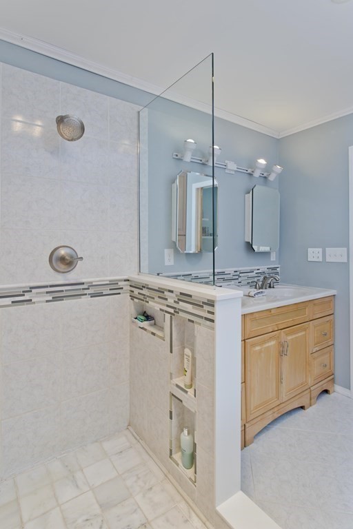 146 Huntington Road Russell, MA 01071 - Photo 35 of 42 a bathroom with a granite countertop sink a mirror and a shower