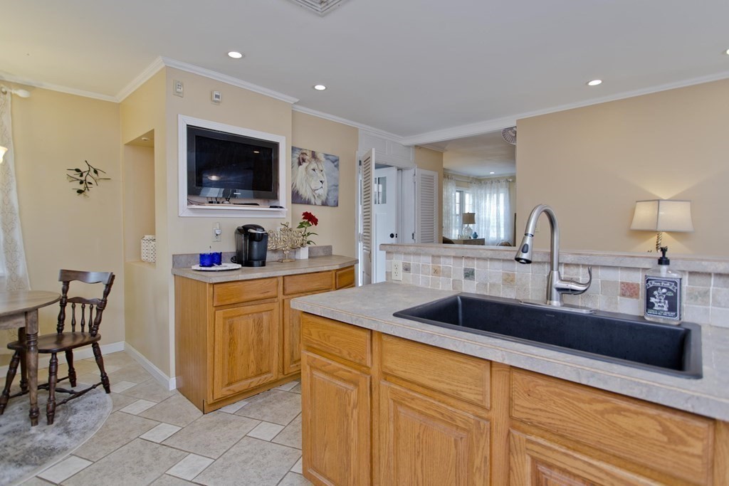 146 Huntington Road Russell, MA 01071 - Photo 10 of 42 a kitchen with stainless steel appliances granite countertop a sink and a microwave