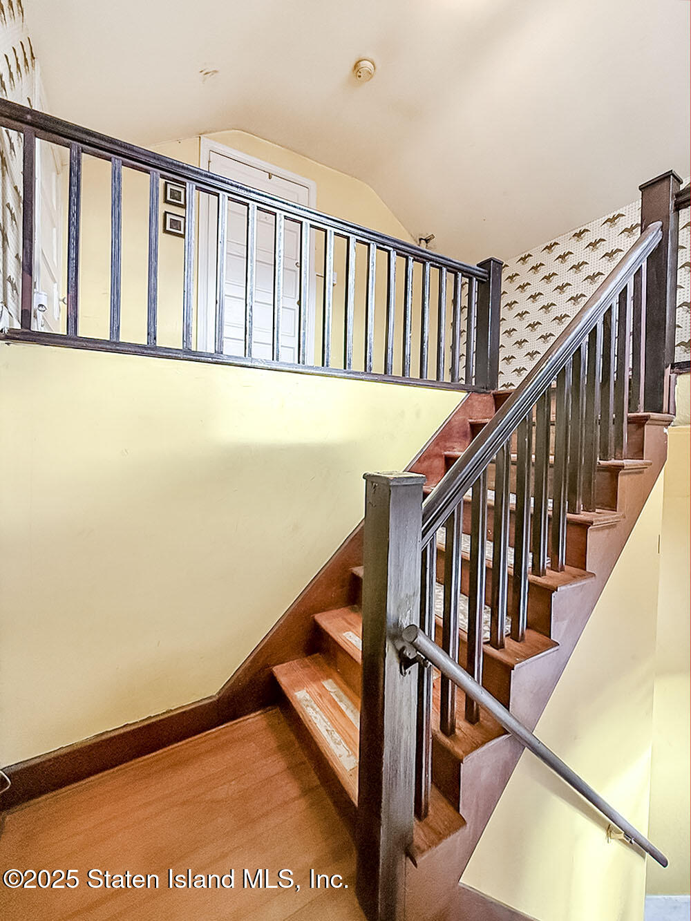 151 Clinton B Fiske Avenue Staten Island, NY 10314 - Photo 21 of 33 a view of staircase with railing and a window