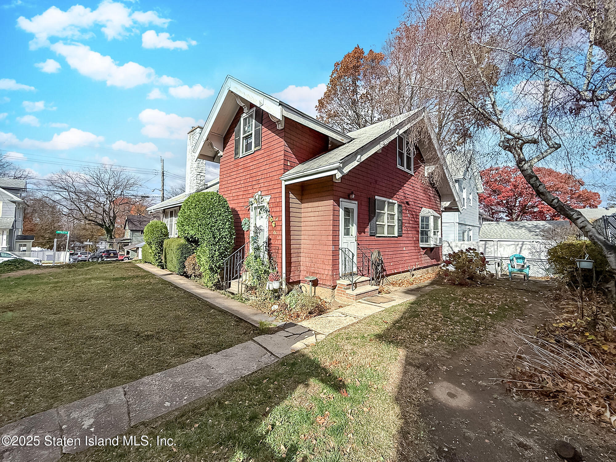 151 Clinton B Fiske Avenue Staten Island, NY 10314 - Photo 29 of 33 a view of a house with a yard