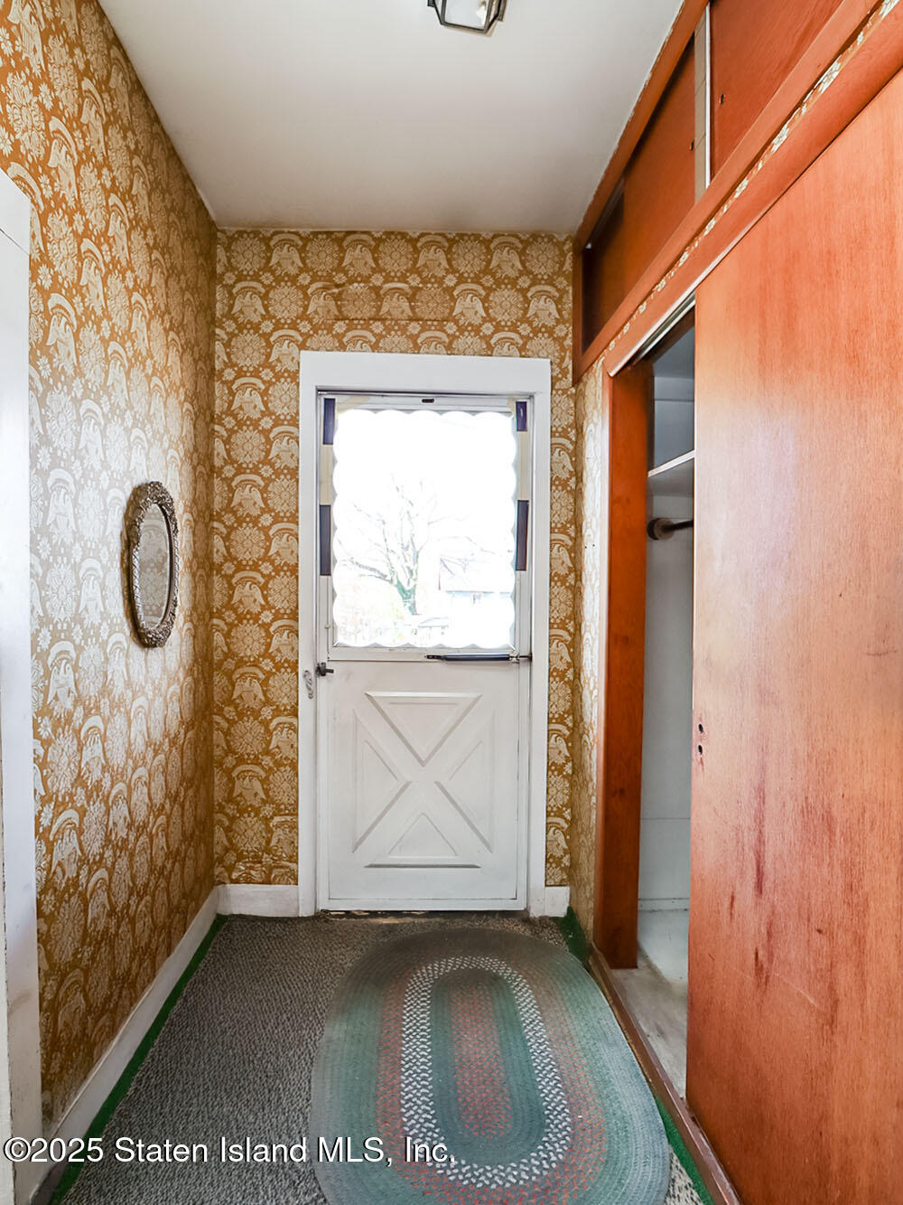 151 Clinton B Fiske Avenue Staten Island, NY 10314 - Photo 6 of 33 a view of front door with wooden floor