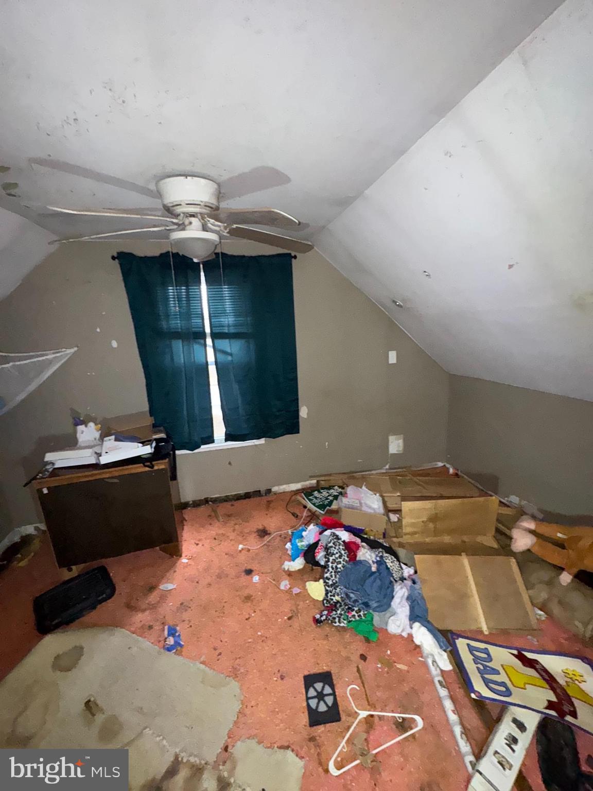 491 Broad Street Houston, DE 19954 - Photo 12 of 22 a bedroom with a bed and a table