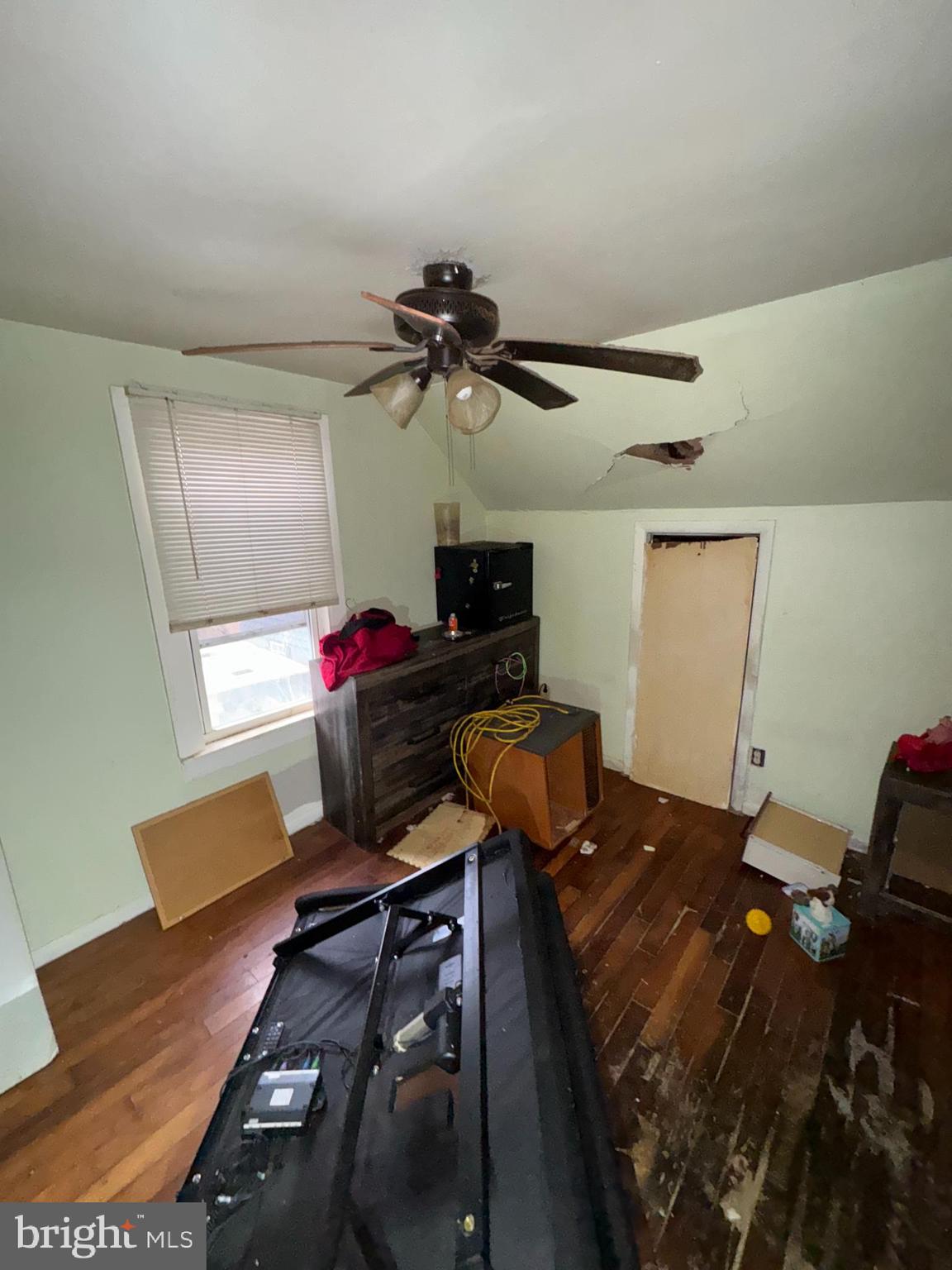491 Broad Street Houston, DE 19954 - Photo 13 of 22 a workspace with furniture and wooden floor