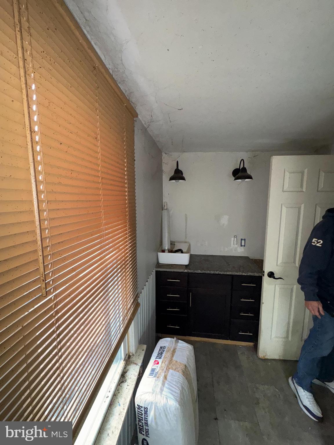 491 Broad Street Houston, DE 19954 - Photo 8 of 22 a bedroom with a bed and a dresser