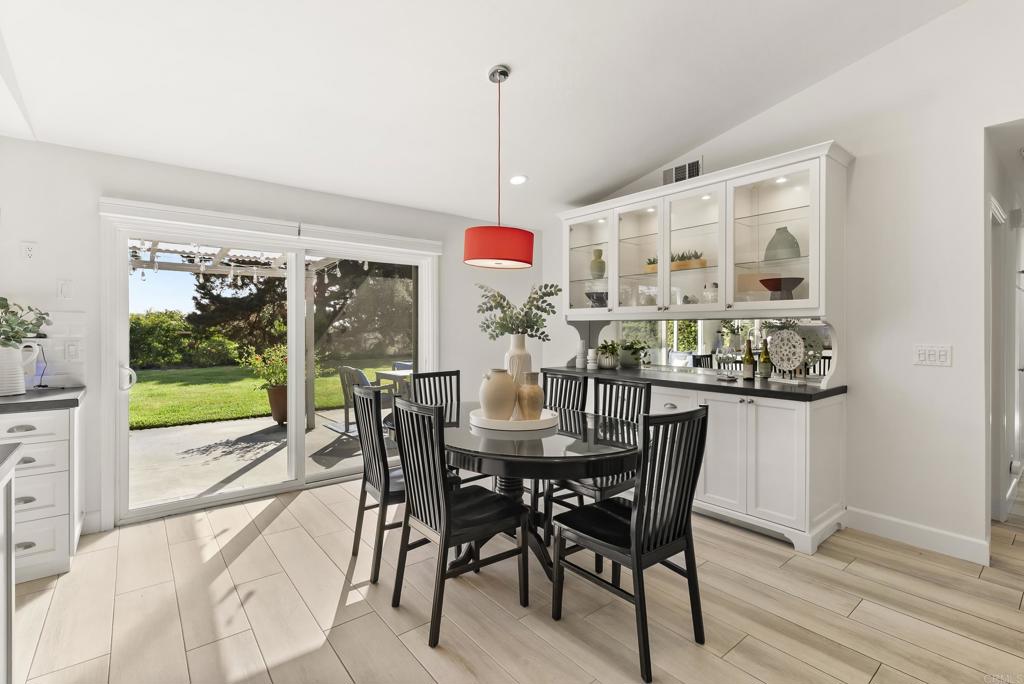 147 Witham Road Encinitas, CA 92024 - Photo 17 of 47 a view of a dining room with furniture window and outside view