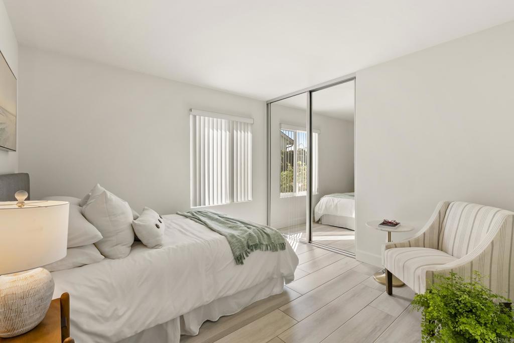 147 Witham Road Encinitas, CA 92024 - Photo 23 of 47 a bedroom with a bed and a couch