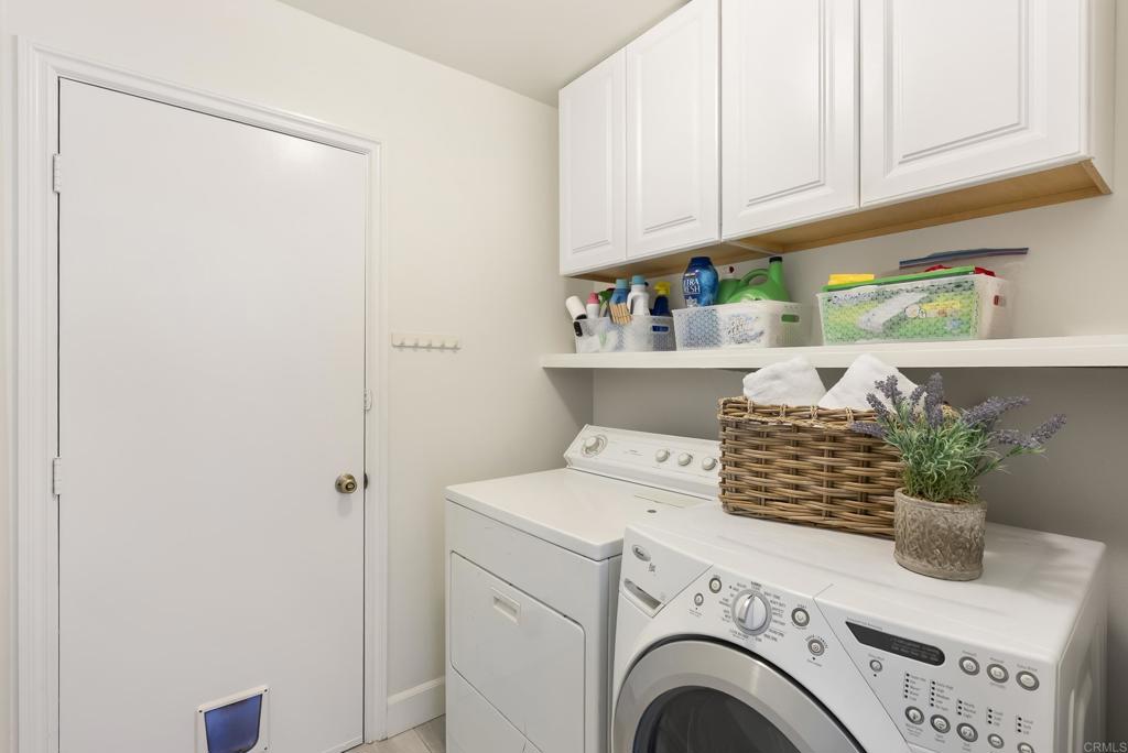 147 Witham Road Encinitas, CA 92024 - Photo 24 of 47 a view of kitchen with washer and dryer