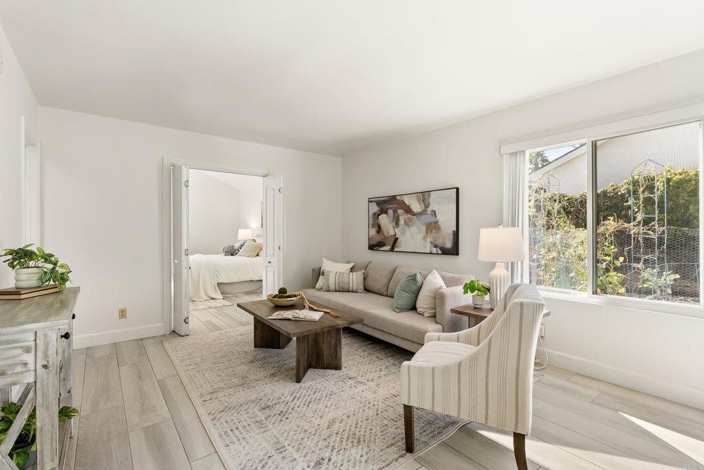 147 Witham Road Encinitas, CA 92024 - Photo 25 of 47 a living room with furniture and a large window