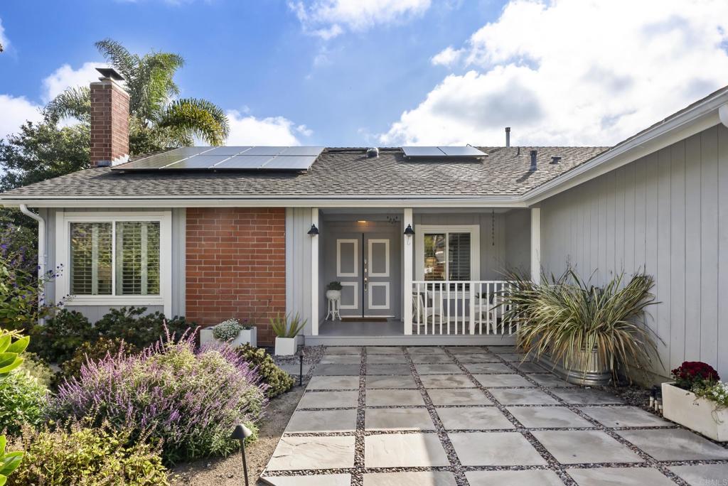 147 Witham Road Encinitas, CA 92024 - Photo 5 of 47 a front view of a house with garden