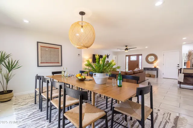 a bedroom with a bed and a lamp