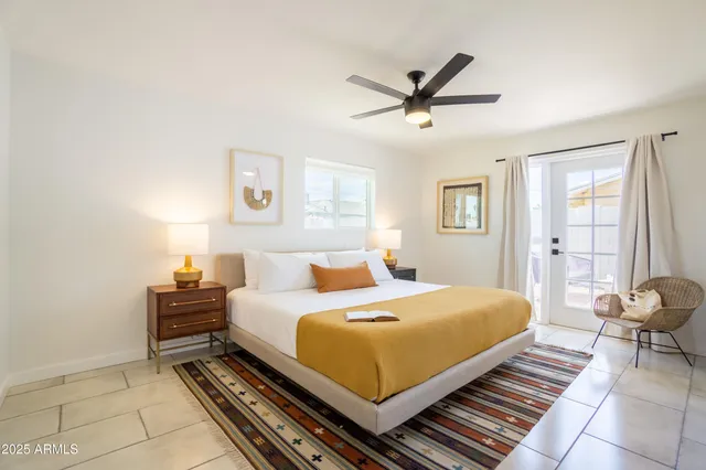 a bathroom with a sink toilet and mirror
