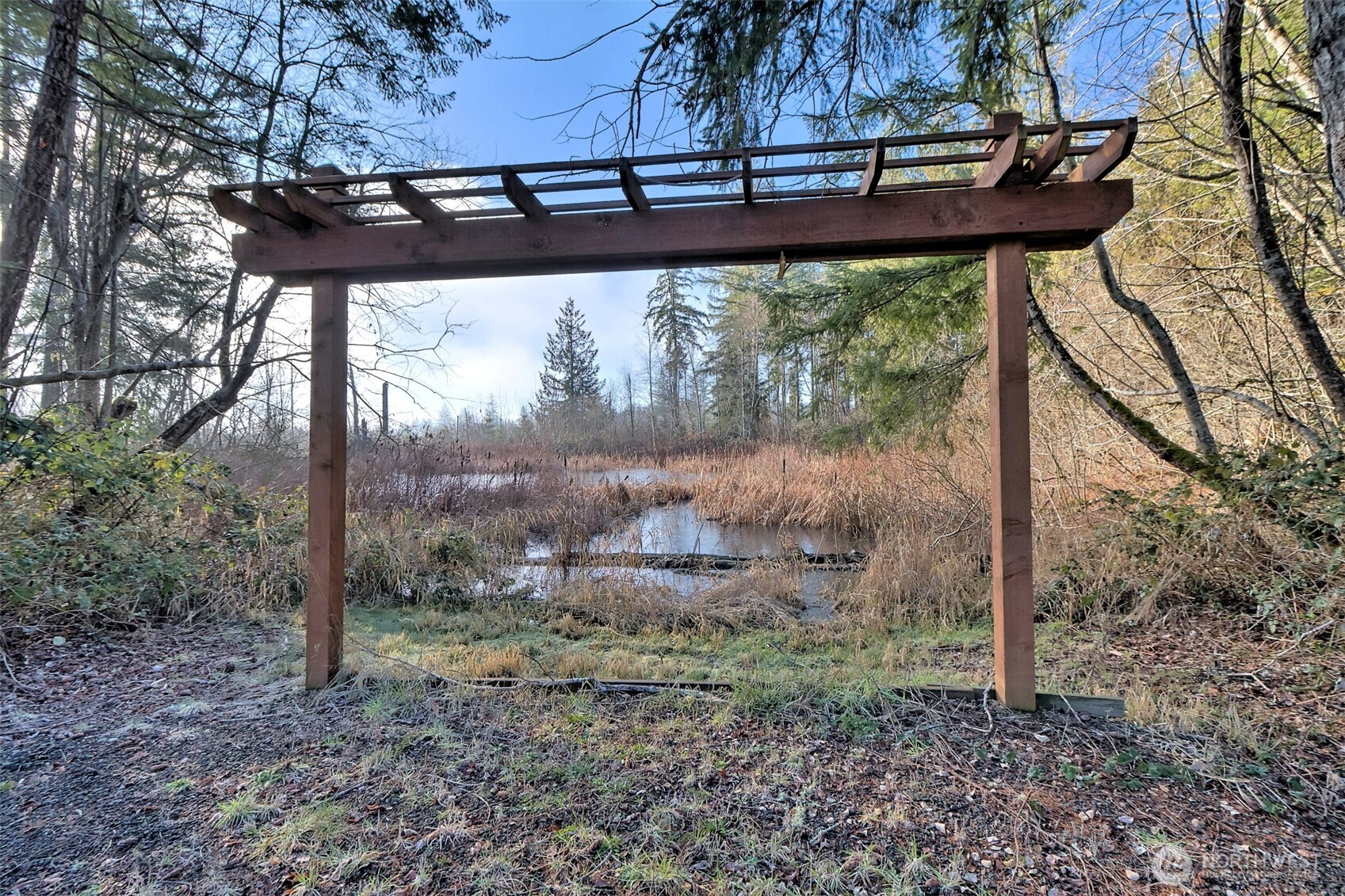 660 Southeast Cook Plant Farm Road Shelton, WA 98584 - Photo 11 of 27 a view of a porch with furniture and a yard