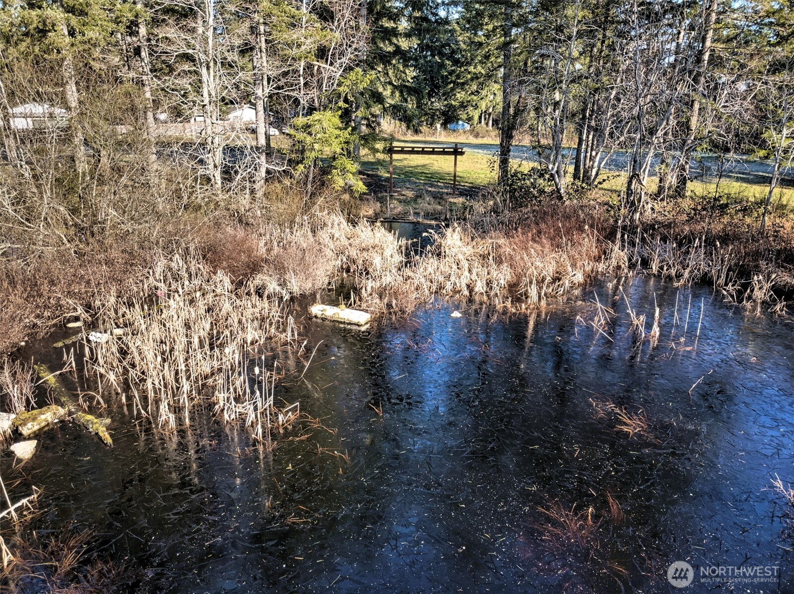 660 Southeast Cook Plant Farm Road Shelton, WA 98584 - Photo 17 of 27 a view of a yard with wooden fence