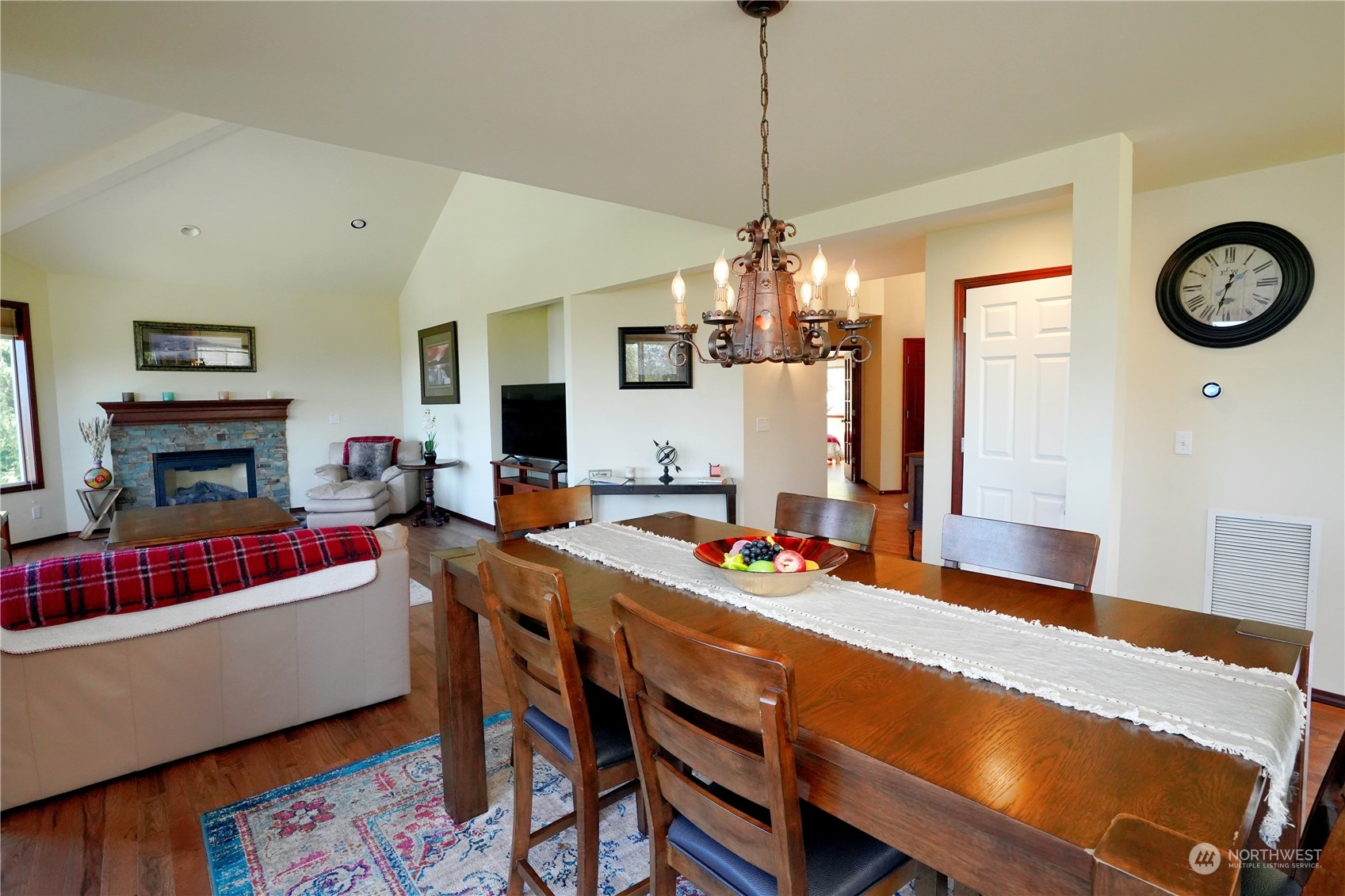 522 Fox Hollow Road Sequim, WA 98382 - Photo 14 of 40 a dining room with wooden floor and chandelier