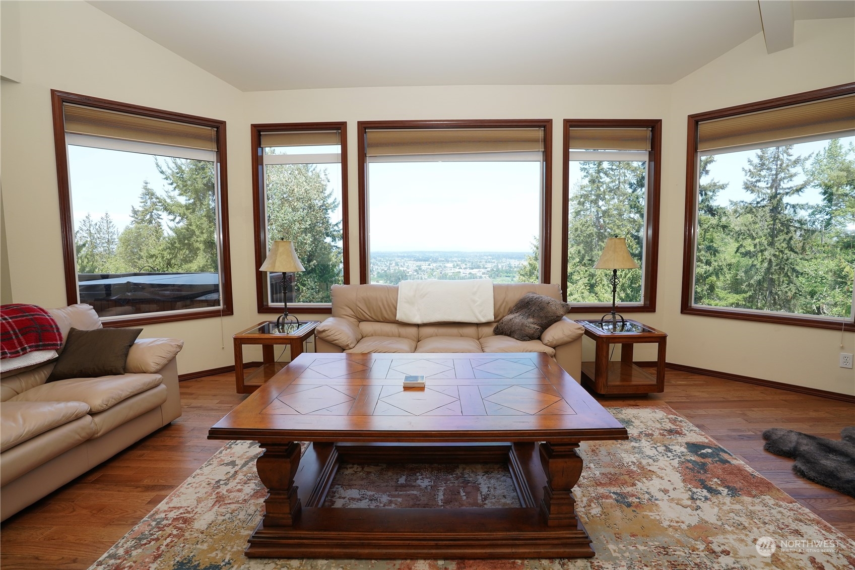 522 Fox Hollow Road Sequim, WA 98382 - Photo 16 of 40 a living room with furniture a large window and a table