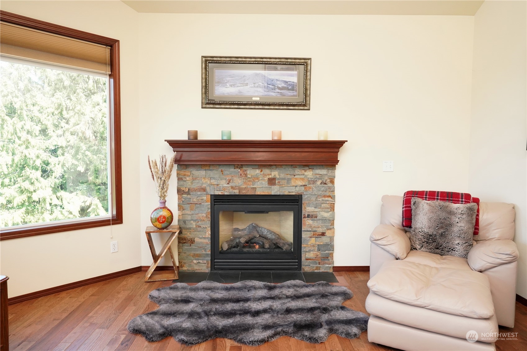 522 Fox Hollow Road Sequim, WA 98382 - Photo 17 of 40 a living room with furniture and a fireplace