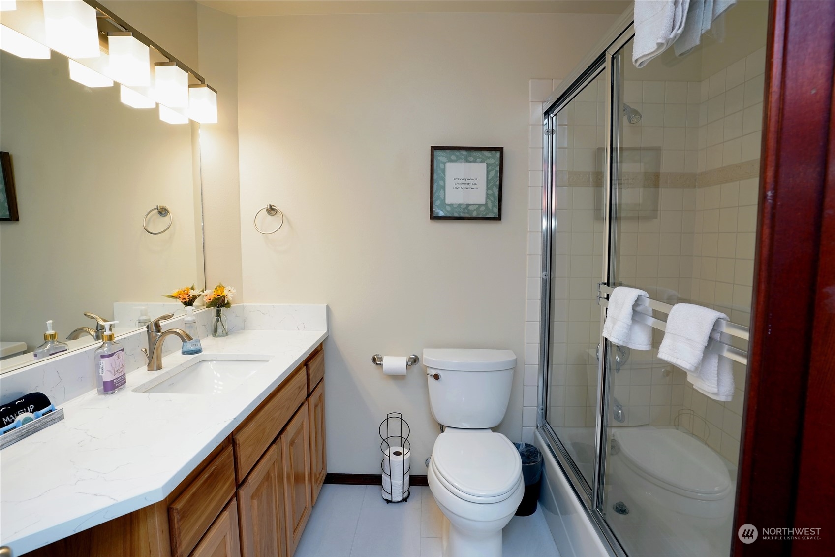522 Fox Hollow Road Sequim, WA 98382 - Photo 30 of 40 a bathroom with a sink mirror vanity and toilet
